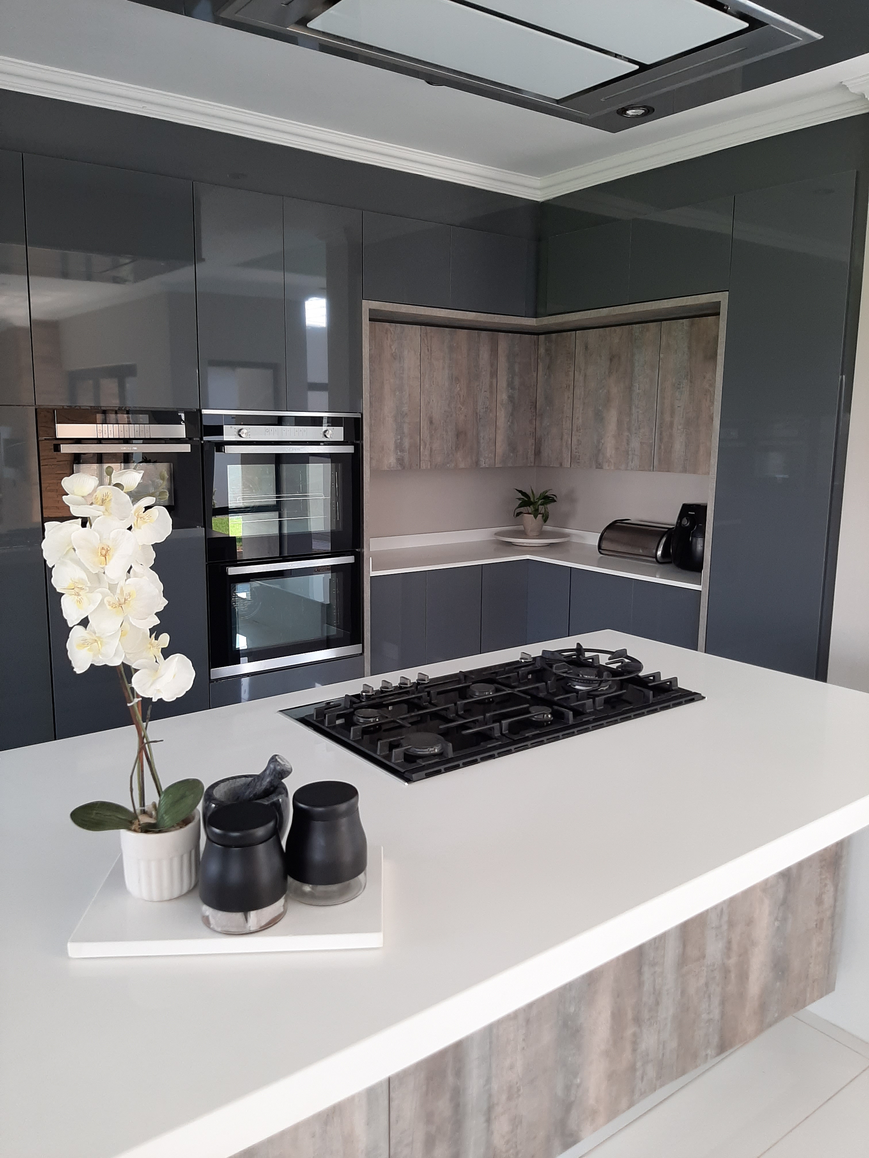 Kitchen with wooden finish cupboards